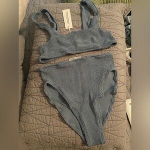 You swim. Swimsuit fits a size 2-12. Never worn still has tags